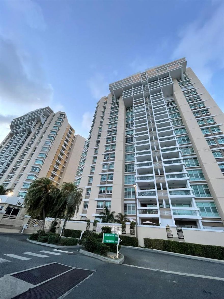 Modern Two-Story Penthouse in Mirador del Parque – Hato Rey: Step into elevated living in this 3-bedroom, 3.5-bath unfurnished penthouse, offering 4,800 sq. ft. of elegant space spread across two levels. Featuring soaring ceilings, dramatic crystal chandeliers, and large open areas, this home is designed to impress. The modern kitchen comes equipped with top-of-the-line appliances, and the layout includes walk-in closets, a private laundry room, and three assigned parking spaces. Enjoy panoramic views from your balconies and the comfort of a full-service building with 24/7 security, pool, gym, clubhouse, water cistern, and a full backup generator. Also for Sale: $1,450,000. HOA: $760/month. Luxury and convenience in the heart of Hato Rey.