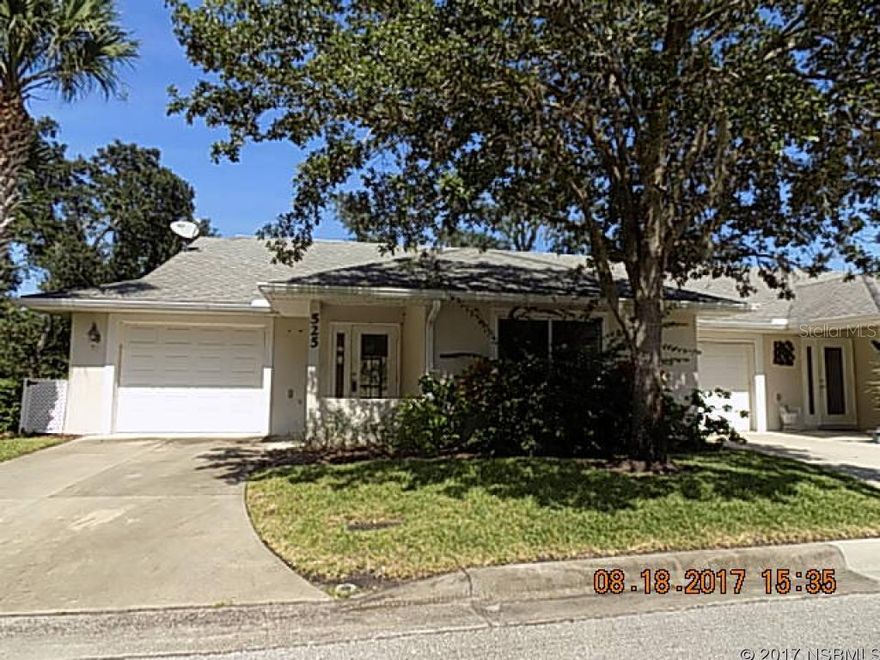 This villa needs some basics to make it your own. It offers two beds, 2 bath, with spacious living room with cathedral ceilings, ceiling fans, recessed lighting, private driveway to an over sized 1 car garage with washer/dryer H/U and storage area, hurricane shutters in the garage. The enclosed porch has a store room leading to a deck overlooking green space.In the heart of New Smyrna. ;Water: City