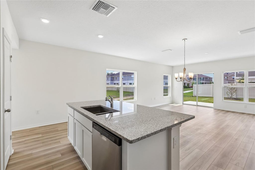 Photo of 671 Meadows Edge Place, Lake Wales, FL 33859 (MLS # O6443312)