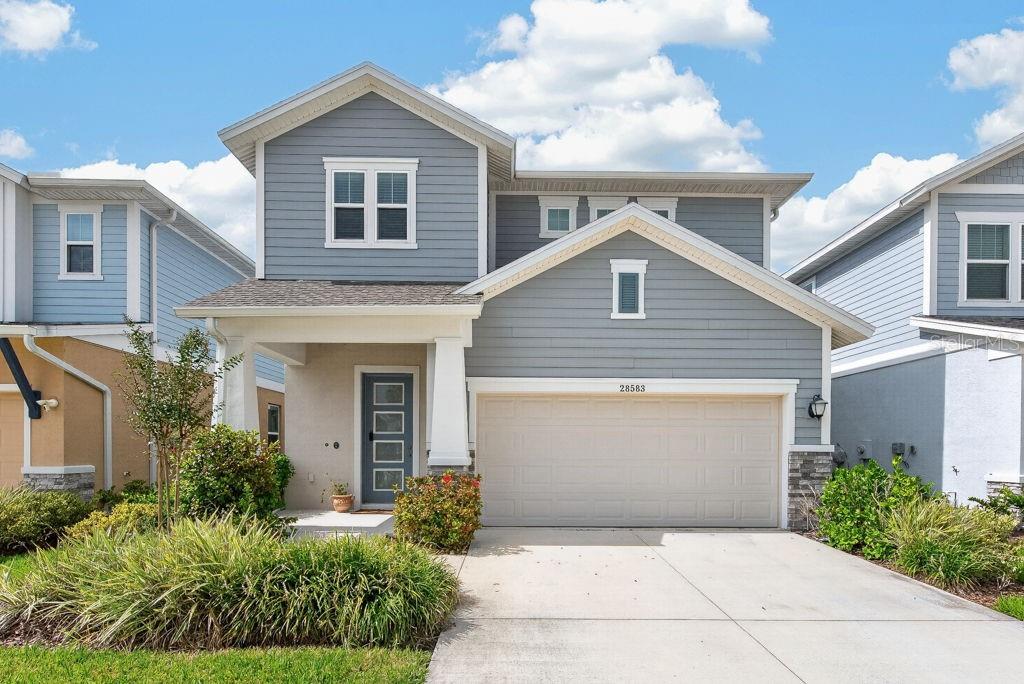 Photo of 28583 Cozy Creek Drive, Wesley Chapel, FL 33543 (MLS # TB8544896)