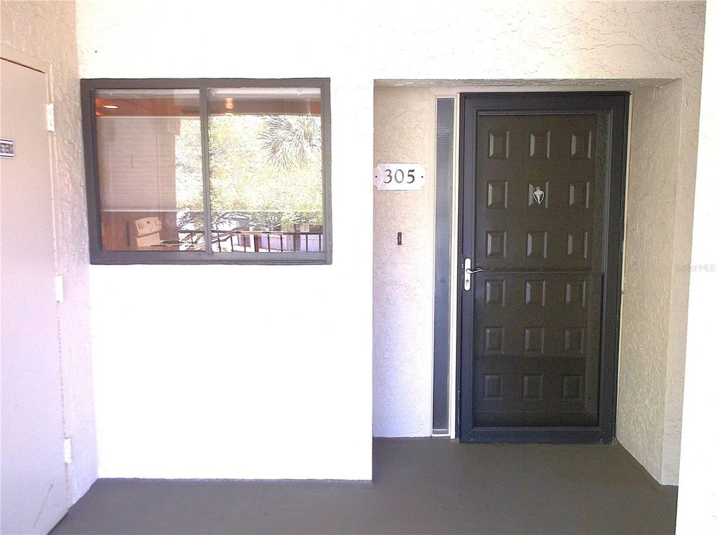 Photo of 9433 Harbor Greens Way #305, Seminole, FL 33776 (MLS # TB8488944)