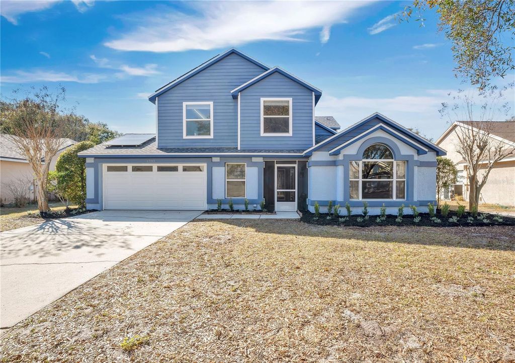 Photo of 3395 Hillmont Circle, Orlando, FL 32817 (MLS # O6381713)