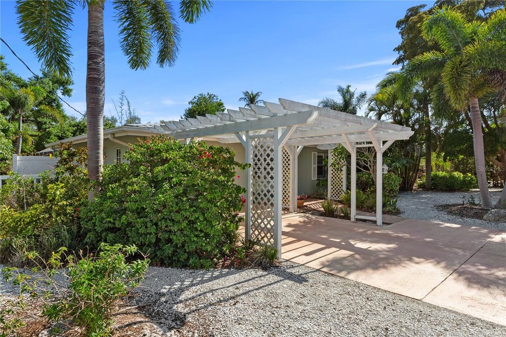 Photo of 7860 Holiday Drive, Sarasota, FL 34231 (MLS # A4691644)