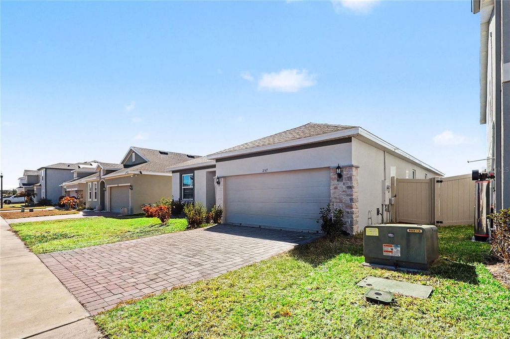 Photo of 257 Hamlet Loop, Davenport, FL 33837 (MLS # O6381327)
