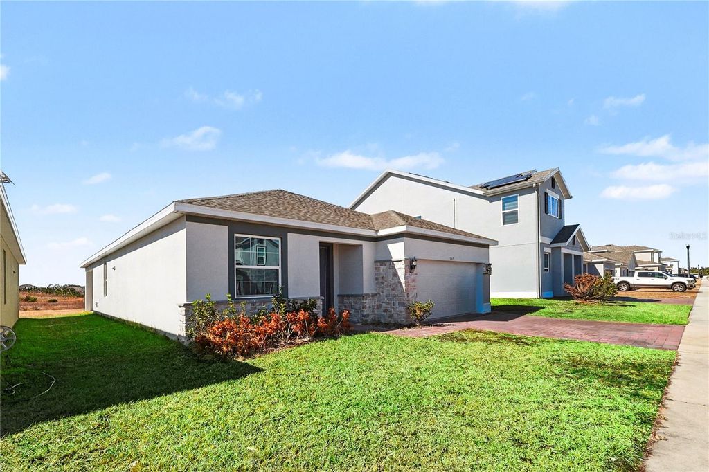 Photo of 257 Hamlet Loop, Davenport, FL 33837 (MLS # O6381327)
