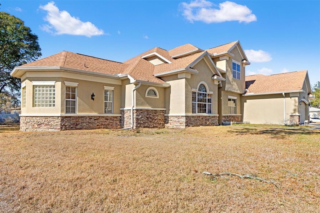 Photo of 421 Nessler Way, Spring Hill, FL 34609 (MLS # W7882383)