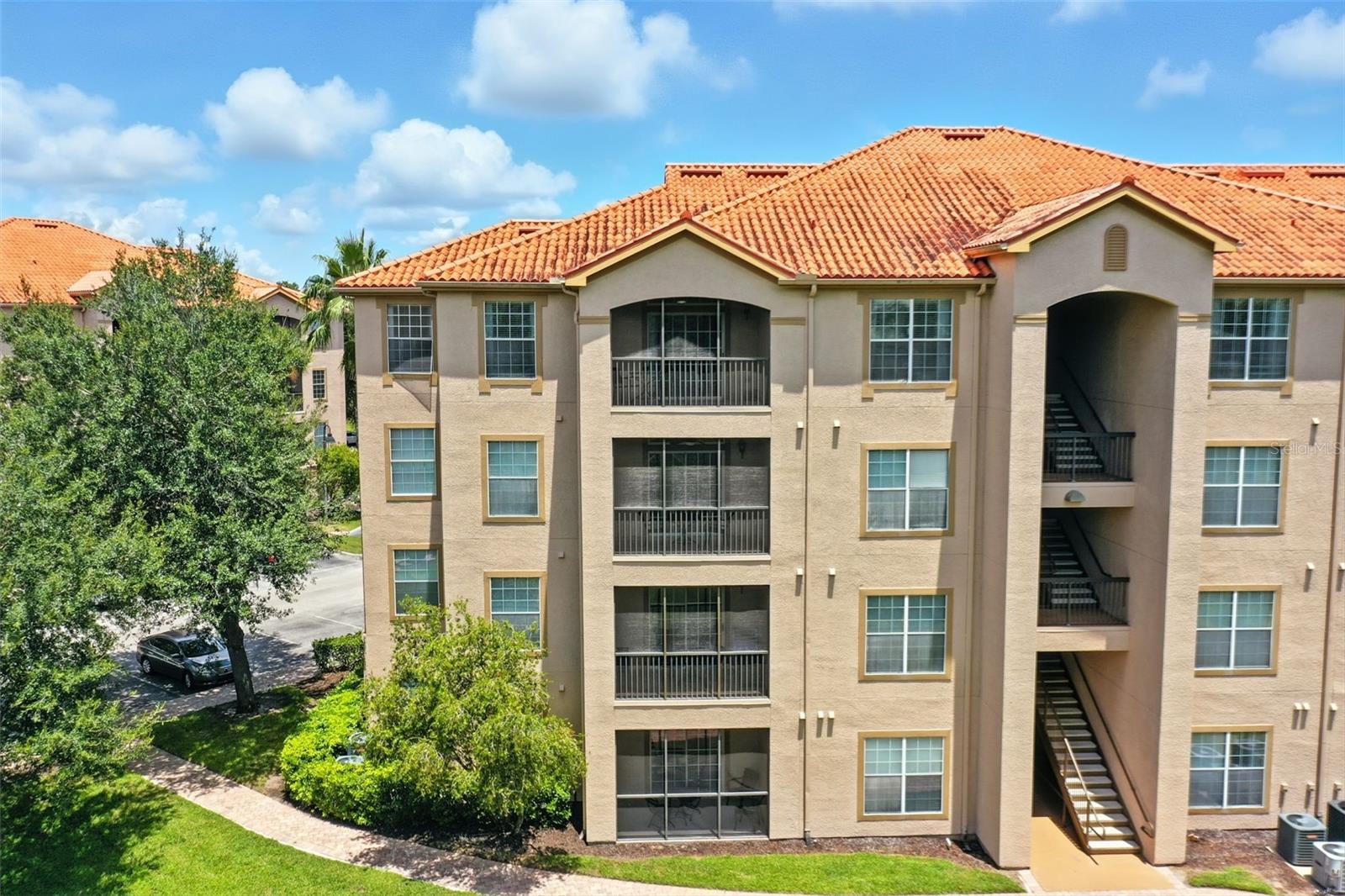 Fully Furnished 2nd-Floor Retreat – Minutes from Disney Welcome to your treetop escape in the gated Tuscana Resort. This 2-bedroom, 2-bath condo sits on the 2nd floor with elevator access, offering peaceful views of lush nature preserves from your private balcony. Inside, every detail is ready for you, from the fully equipped kitchen and in-unit washer/dryer to the curated furnishings and walk-in primary closet. Here, resort-style living is just steps away: lounge by the pool, work out in the fitness center, wander the walking trails, or dine at the on-site restaurant. And when adventure calls, you’re minutes from Walt Disney World, championship golf, and Central Florida’s best attractions. Whether you’re seeking a turnkey primary home, a vacation getaway, or a property with rental potential, this condo delivers instant lifestyle and endless possibilities.