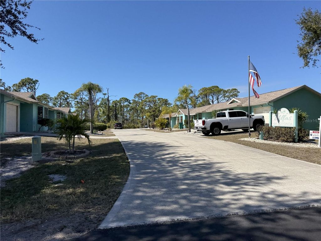 Photo of 255 Boundary Boulevard #104, Rotonda West, FL 33947 (MLS # C7521585)