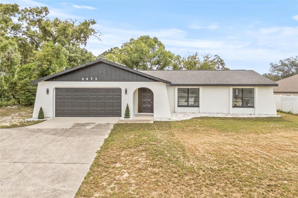 Photo of 2473 Mariner Boulevard, Spring Hill, FL 34609 (MLS # TB8405017)