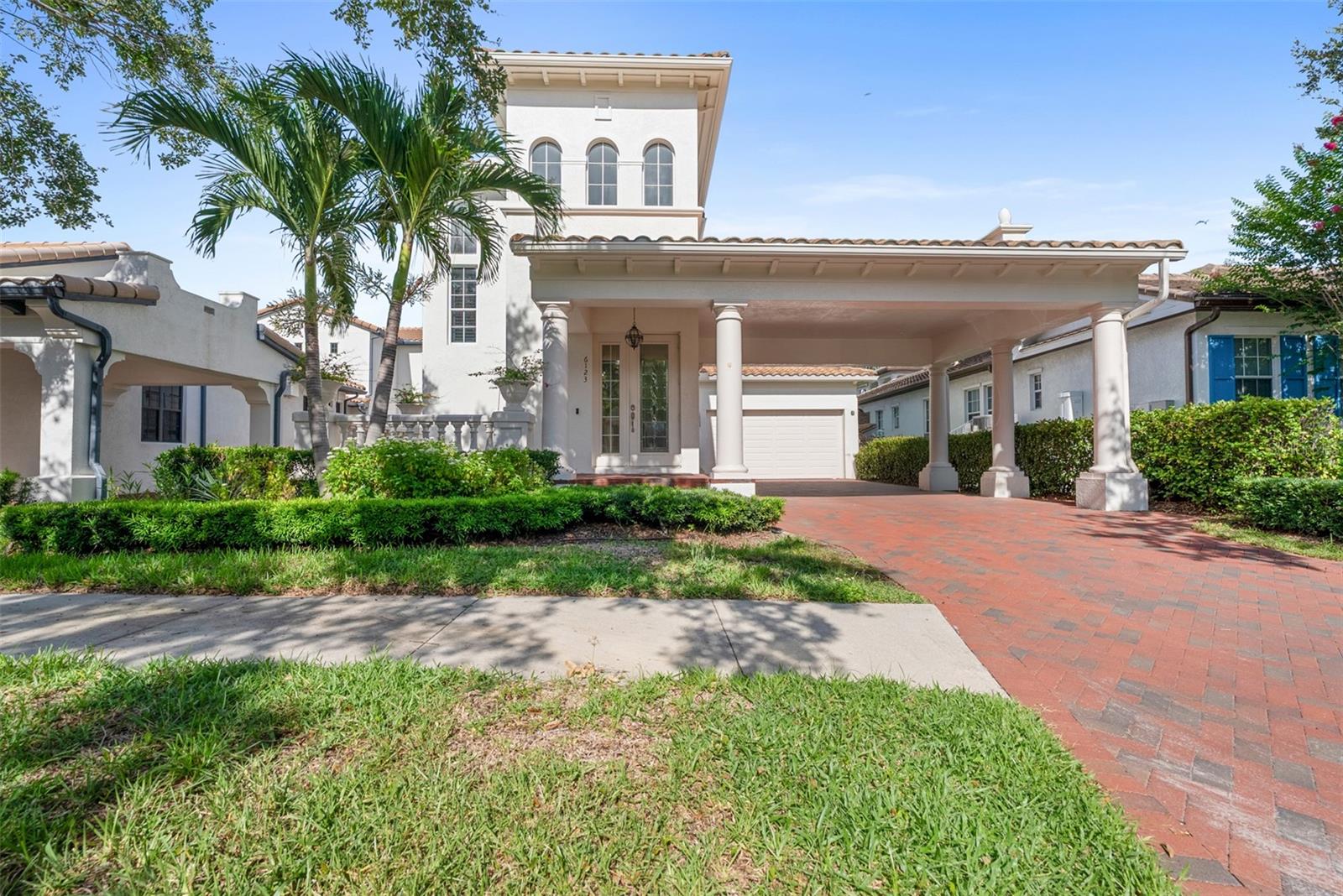 One or more photo(s) has been virtually staged. Stunning Tuscan Villa in Tampa’s premier gated waterfront community – Westshore Yacht Club! This fully renovated 4BR/5BA home offers 3,600 sq ft of luxury living with over $200K in upgrades. Enter through a grand 24-ft foyer into elegant formal spaces, including a chef’s kitchen with porcelain countertops, slab backsplash, butler’s pantry & breakfast nook. The spacious family room opens to a covered lanai with outdoor kitchen, pool & spa – perfect for entertaining. First-floor guest suite with ensuite bath + walk-in closet. Upstairs, the owner’s retreat features 2 balconies, a sitting room, and a spa-like bath with freestanding tub & large shower. Two additional ensuite bedrooms & laundry up. Includes a 2-car garage, Porte Cochere, and brick paver drive. Enjoy 24/7 security, marina access, Bay Club dining, 2 pools, Tiki Bar, fitness center, spa, and more!