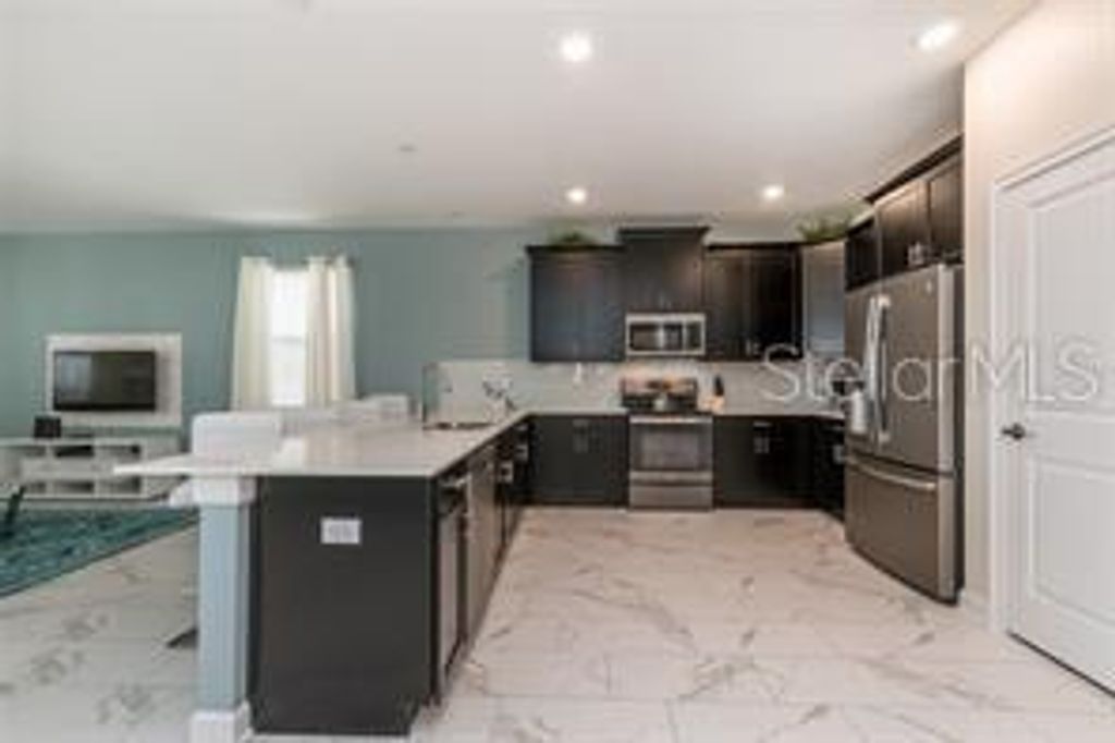 Photo of 1525 Flange Drive, Davenport, FL 33896 (MLS # O6367103)