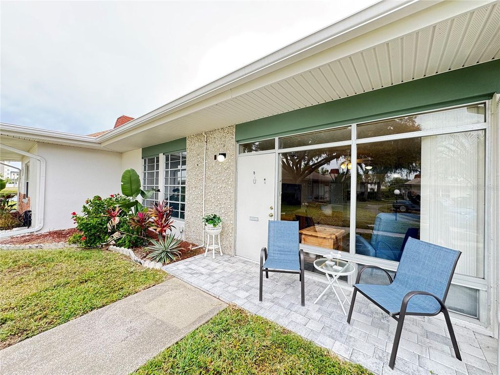 Photo of 4316 Tahitian Gardens Circle #B, Holiday, FL 34691 (MLS # A4671723)