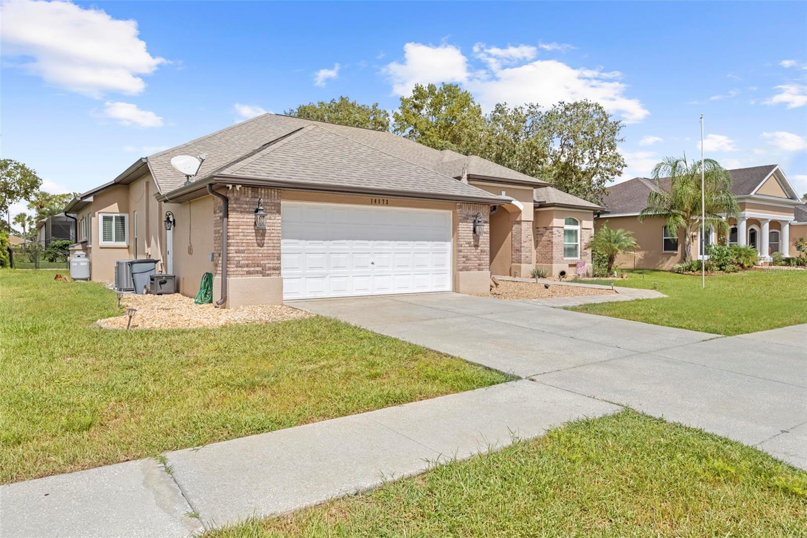 Welcome to this Gorgeous 4BR, 2.5BA, 3,200+ sqft home with modern updates in the gated Pristine Place community. Features include new double doors w/smart lock, plantation shutters (2023), formal living & dining w/built-in bar, family room w/fireplace, and a chef’s kitchen w/wood cabinets, granite, Samsung air-fryer stove, farmhouse sink, and island. The primary suite offers a jetted tub, walk-in shower, dual vanities, and 2 walk-in closets. Enjoy a wet bar w/wine fridge, 2017 roof, and new windows (2023). Outdoor living shines w/screened lanai, outdoor kitchen w/Blaze appliances & $8K Hibachi, resurfaced heated saltwater pool w/Nebula lighting, and firepit. Community amenities: clubhouse, pool, fitness, playground, tennis. Easy Suncoast Pkwy access to Tampa. Want to know more about this exceptional property? Inquire now for details.