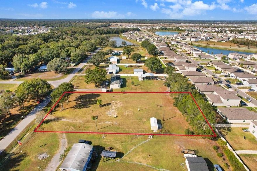 ***Best valued vacant land parcel in Lakeland. Cleared, Well & Septic, Impact fees covered*** Welcome to 4005 Timberwood Drive. An exceptional high and dry 1.08-acre cleared homesite positioned in one of South Lakeland’s most convenient and desirable areas with no HOA or CDD Fees. This thoughtfully prepared parcel is truly turnkey, featuring a brand-new storage shed, plus an operational well and septic system, giving future owners a tremendous head start on construction. With impact fees already paid for over three years, significant upfront costs are eliminated, making this one of the most value-packed land opportunities on the market. Whether you envision a custom-built residence or prefer the versatility of a quality mobile home, this property accommodates both. The expansive acreage offers space for outdoor living, workshops, gardens, or simply room to enjoy the privacy and quiet that Timberwood Dr provides. Perfectly positioned near everyday essentials and major thoroughfares, the location offers the ideal blend of peaceful rural surroundings with quick access to Lakeland’s shopping, dining, and commuter routes. This is the land that lets your vision come to life - ready, cleared, and waiting for its next owner.