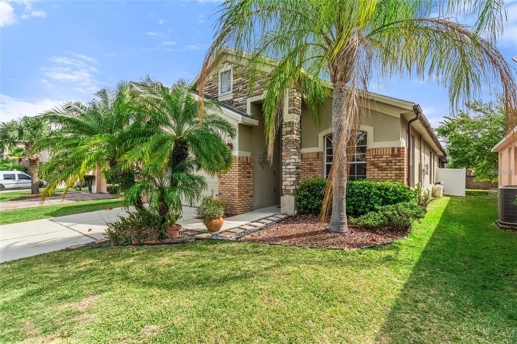Photo of 15031 Huntcliff Park Way, Orlando, FL 32824 (MLS # O6442550)