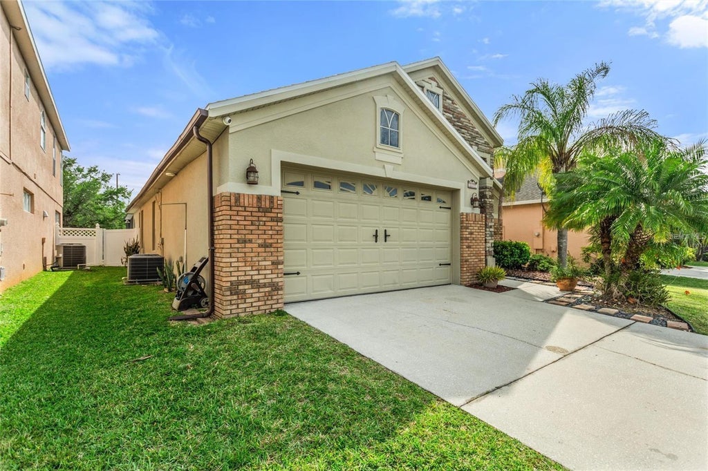 Photo of 15031 Huntcliff Park Way, Orlando, FL 32824 (MLS # O6442550)