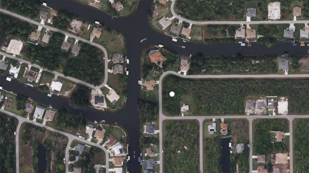 Photo of 10185 Owl Head Circle, Port Charlotte, FL 33981 (MLS # GC533018)