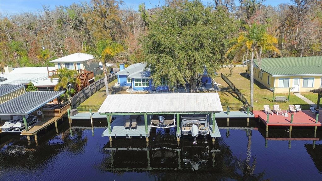 Photo of 1621 Spring Garden Drive, Astor, FL 32102 (MLS # OM718329)