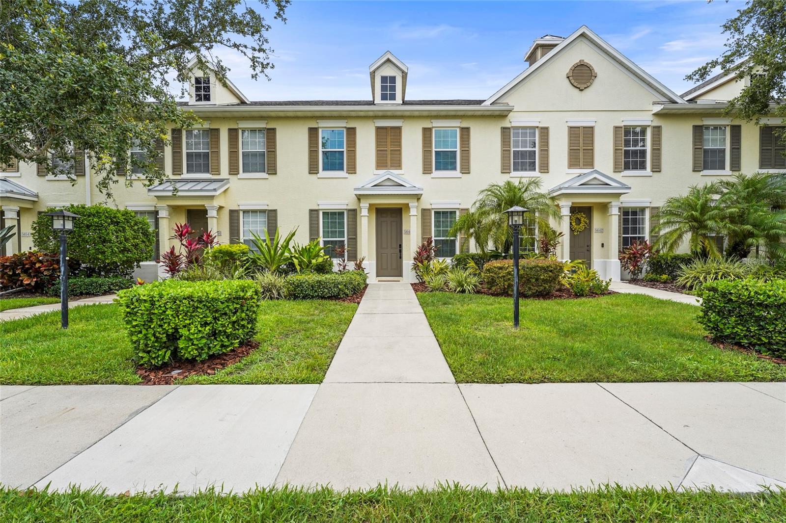 Located in Harborage on Braden River, this fully remodeled 3-bedroom, 2.5-bath townhouse offers a gated, maintenance-free lifestyle surrounded by natural beauty and resort-style amenities. The home features a versatile den or formal dining area, new roof, and hurricane impact windows and doors. Interior highlights include tall ceilings, luxury vinyl flooring throughout, and a spacious kitchen with quartz countertops, waterfall island with breakfast bar, stainless steel appliances, and sizeable pantry. The open floor plan connects the kitchen and living area, ideal for functional living.The primary suite upstairs features tray ceilings, accent wall, dual vanities, and a walk-in shower. Two additional bedrooms share a full bath. A half bath is located on the main floor. Enjoy a private, fenced courtyard for outdoor living. The air-conditioned 2-car garage includes built-in shelving, epoxy floors, and an EV charger. Community amenities include a clubhouse, heated resort-style pool and spa, 24-hour fitness center, kayak/canoe launch, nature trails, boardwalks, riverfront gazebo, picnic areas, and fishing pier. Marina access available with boat lifts for lease (subject to availability). Conveniently located near shopping, dining, and major roadways.