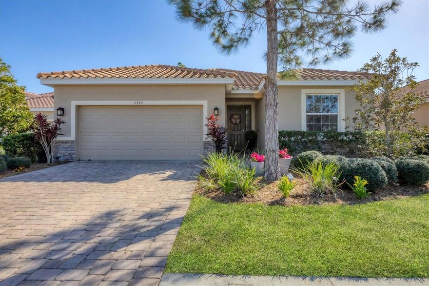 One or more photo(s) has been virtually staged. Cul-de-sac charm, coastal vibes, and low maintenance living – this one feels like home! Perfectly positioned in the heart of Sarasota, this thoughtfully refreshed 3 bedroom, two and a half bath, plus office residence offers versatility for comfortable modern living. Delivering a light-filled, open concept layout - the kitchen takes center stage with extended quartz countertops, a stunning oversized island, a sleek glass-tile backsplash and built-in beverage bar – perfect for gathering and entertaining.  The den, complete with French doors, provides a private retreat suited for a fourth bedroom, an office, or playroom. The bedrooms have been outfitted with custom closets, and the bathrooms have been elevated with a light, refined aesthetic. Enjoy time outdoors on your private screened-in lanai overlooking a fully fenced backyard – ideal for relaxing, outdoor activities and a place for your furry family members to roam and play. Located in THE top-rated school district of Ashton Elementary, Sarasota Middle and Riverview High and just a short drive from world-renowned Siesta Key Beach, Downtown Sarasota, I-75, Legacy Trail and Urfer Family Park- this home offers an elevated blend of convenience and lifestyle!