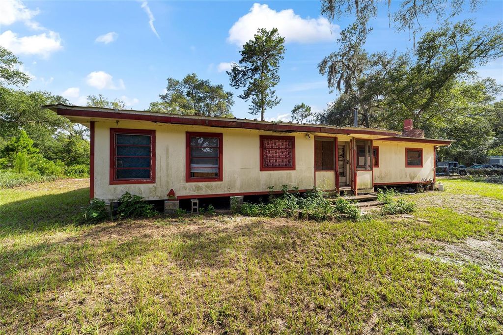 Photo of 18631 SE 106th Place, Ocklawaha, FL 32179 (MLS # W7877658)