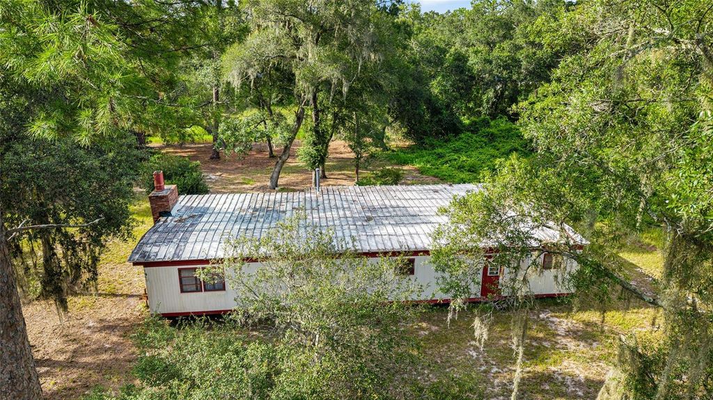 Photo of 18631 SE 106th Place, Ocklawaha, FL 32179 (MLS # W7877658)