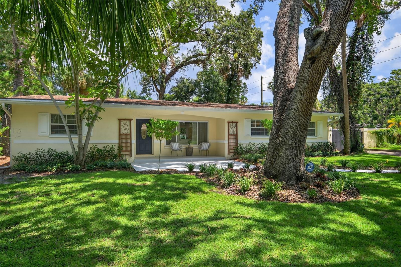 “Easy Breezy Living” Featuring 1922 sqft of living space, this home has a lot to offer! Located on a double lot off the legendary Park Street, this 3-bedroom, 2.5-bathroom home with an interior laundry room includes an attached 2-car garage. The open floor plan includes a spacious living room at the front of the house with a newly updated kitchen. You'll find the large sunlit family room in the rear with a bank of French doors that allow the beauty of the outdoors in. The newly designed kitchen features White Shaker cabinets, quartz countertops, subway glass tile, and new stainless steel appliances. Leading off the kitchen is a large laundry room with additional storage and a convenient ½ bath with easy access to the 2-car attached garage. The 3 bedrooms located on the west side of the home offer a primary en suite bedroom with a walk-in shower and dual closets. The additional 2 bedrooms share a convenient hallway bathroom with additional storage in the hallway. The lush, stunning, mature landscaping in the rear of the home creates a retreat-like setting complete with a large deck across the back of the house, a water feature, putt putt green, as well as room for a boat or RV storage or a pool on the additional side lot. The location has so much to offer with easy access to neighborhood parks and recreation, stunning Peacock sightings along Park St., a short drive to the award-winning Gulf beaches, as well as shopping, dining, and coffee shops along Central Ave and the 66th St cooridor. Located in a non-flood zone. Updates include Roof (2018), HVAC (2019), Water Heater (2018), Whole House Water Softener (2022), Landscaping and Irrigation on well (2025), Vinyl Fence (2024), Kitchen Remodel (2024).