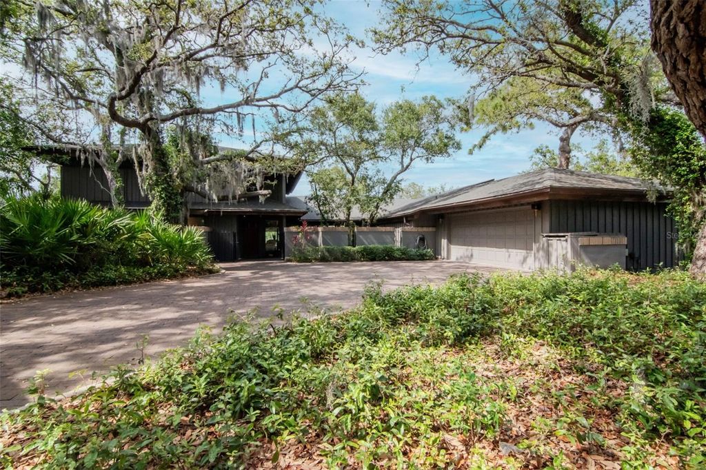 Photo of 1296 Weybridge Lane, Dunedin, FL 34698 (MLS # TB8445062)