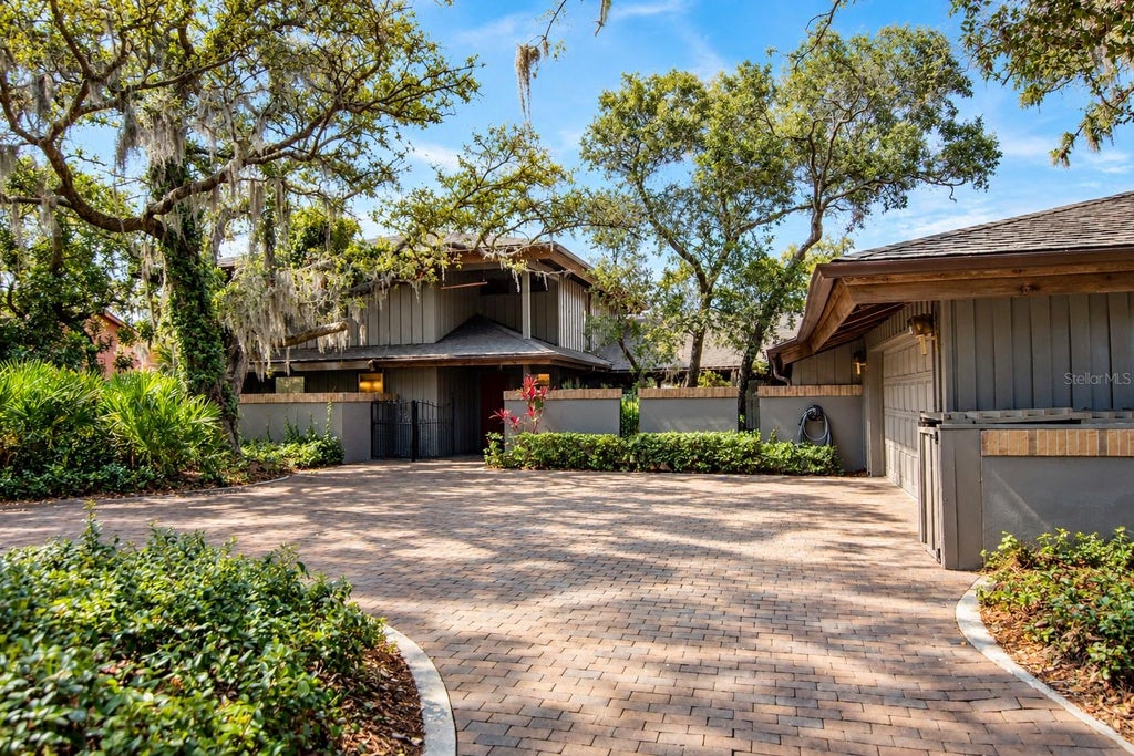 Photo of 1296 Weybridge Lane, Dunedin, FL 34698 (MLS # TB8445062)
