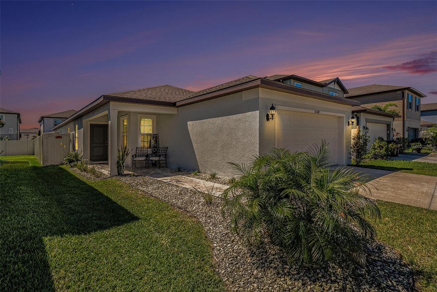 BEAUTIFUL SINGLE-FAMILY HOME in the highly desirable gated community of Wesbridge. This home features 4 bedrooms, 2 bathrooms, and a 2-car garage. Crafted by Pulte, the home boasts an upgraded, contemporary kitchen with quartz countertops, stainless steel appliances, beautiful cabinetry, and a large kitchen island with an eating area. The open floor plan includes a spacious living and dining room that provides a seamless transition between indoor and outdoor living—creating an ideal space for relaxation and entertainment. Sliding glass doors lead to a lush backyard with a large covered lanai and an added paved grilling area, perfect for summer gatherings and relaxing with friends and family. The fully fenced backyard adds privacy and security. Wesbridge offers resort-style amenities, including a community pool with a waterslide, a dog park, and a playground. It is conveniently located near excellent dining and shopping, with easy access to I-75, I-275, the airport, and downtown Tampa. Explore this meticulously maintained home—schedule your private tour today!