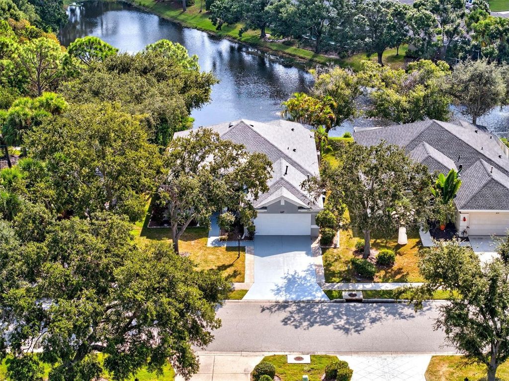 Carlyle At Villages Of Palm-Aire tract | Sarasota Real Estate 4 Photo of 6617 Cheswick Street, Sarasota, FL 34243 (MLS # A4669260)