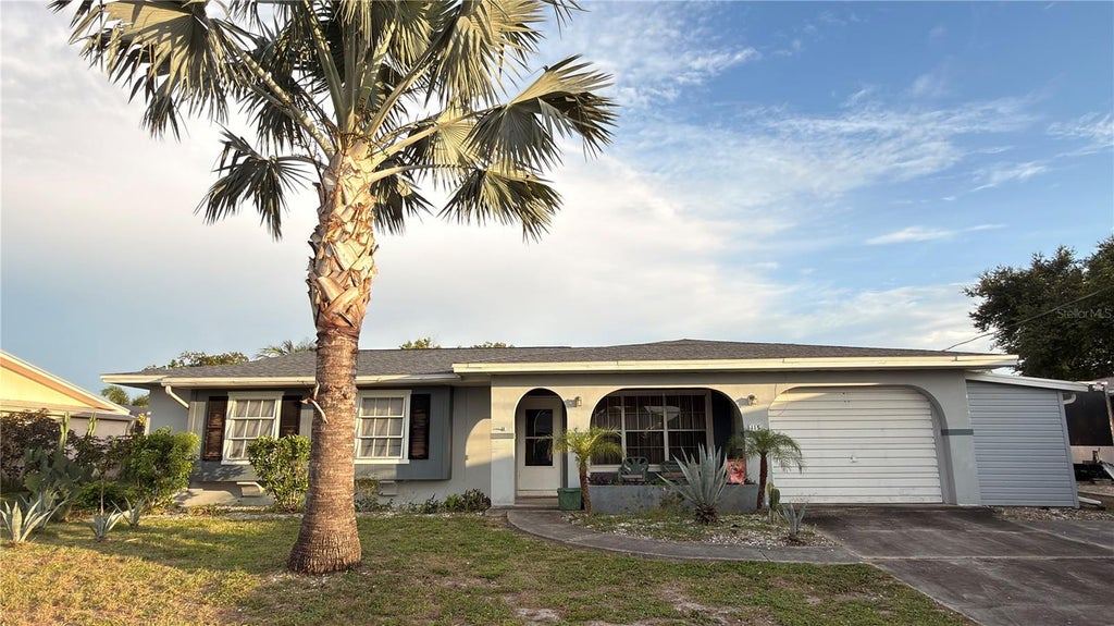 Photo of 115 Bedford Drive NE, Port Charlotte, FL 33952 (MLS # C7527180)