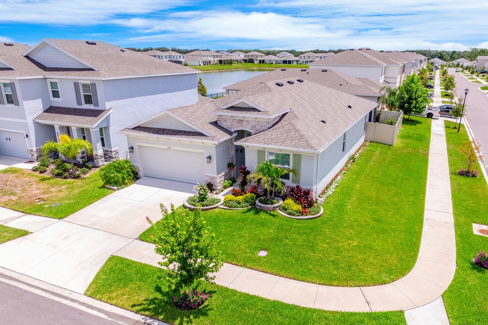 Welcome to this beautiful Lantana model—one of the most popular single-story floor plans in the area! With 2,057 sq. ft., 4 bedrooms, and 2.5 baths, this home offers an open, functional layout with tons of upgrades. In the desirable Avalon Park community with lot of amenities 2 pools, playgrounds, clubhouse and a very family oriented neighborhood. This masterplan community have their very own downtown with restaurants and more.
Highlights you’ll love:
• Low HOA & CDD fees
• Centrally located in a quiet street on a private, fenced corner lot
• No carpet – new luxury vinyl floors throughout
• Extended covered lanai with pavers
• Epoxy garage floor & water softener
• Beautiful landscaping with plantation shutters & accent walls
• In-wall fireplace & extra insulation for comfort and efficiency
• Upgraded kitchen with backsplash and vented hood
• Spacious closets, including his & hers walk-in closets in the master suite with tray ceiling
Top-rated nearby schools include New River Elementary and Pinecrest Academy. You’re just 10 minutes to Publix, restaurants, and shopping, 10 minutes to I-75, 40 minutes to Tampa, and only 5 minutes to the new ER. Golf lovers will enjoy six courses within 10–15 minutes.
This home truly has all the extras to make it feel like home from day one! Schedule your private tour today!