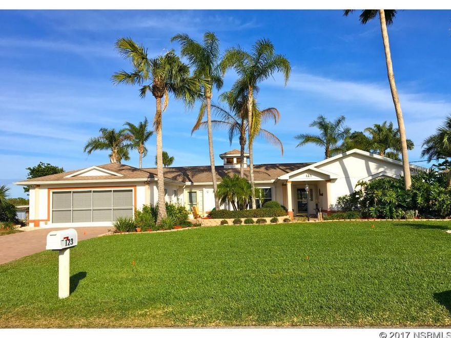 DIRECT INTRACOASTAL WATERWAY 3 bedroom, 3 bath home that was extensively remodeled(02-03) features; river views from the kitchen, large Florida room and master bedroom suite, which has a try ceiling, large walk-in closet, garden tub and double sink vanity. Other features of this home include a large craft or media room off of garage, office with separate entrance, family room, formal living room, dining room with wet bar, large kitchen that offers ample cabinet space and counter top as well as eat-in area. The exterior is complete with lush landscaping, new corner lot seawall and 6000 lb boat lift(2012), folding storm shutters on all windows, paver driveway, walkway and rear patio/BBQ area overlooking the large backyard and Intracoastal Waterway. ;Water: City