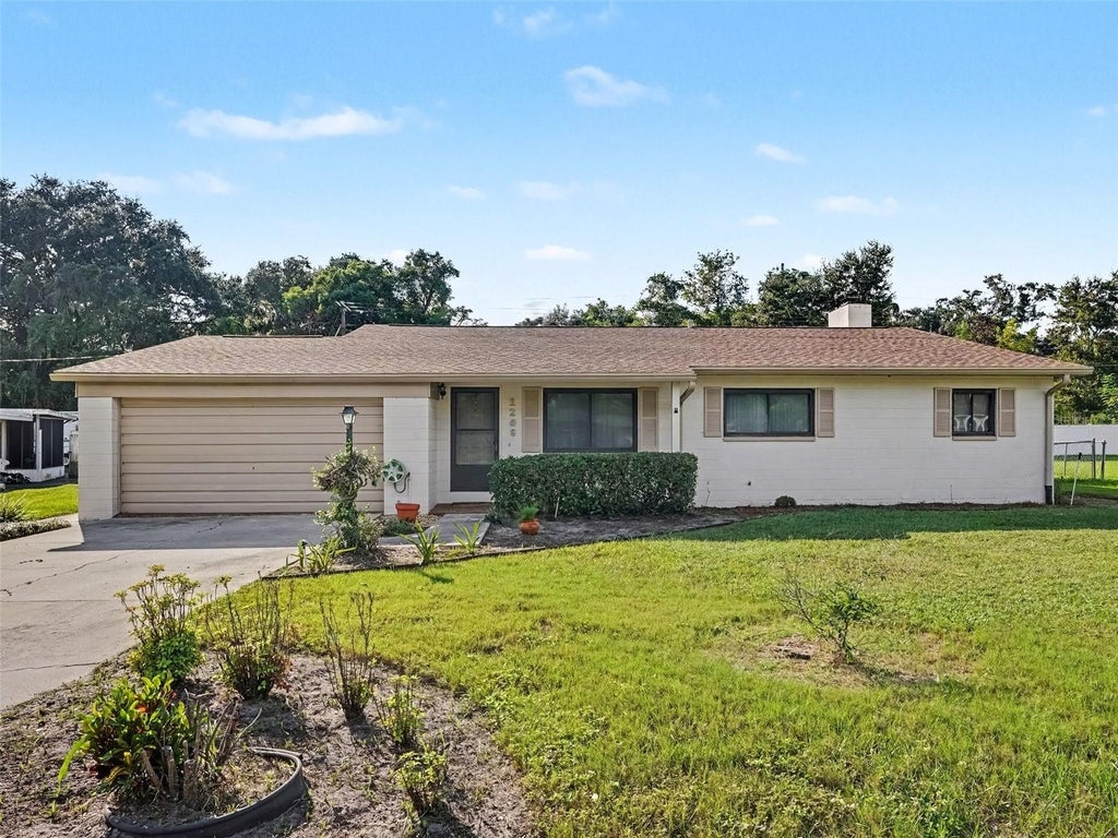 Photo of 1208 Pleasant Place, Lakeland, FL 33801 (MLS # TB8560526)