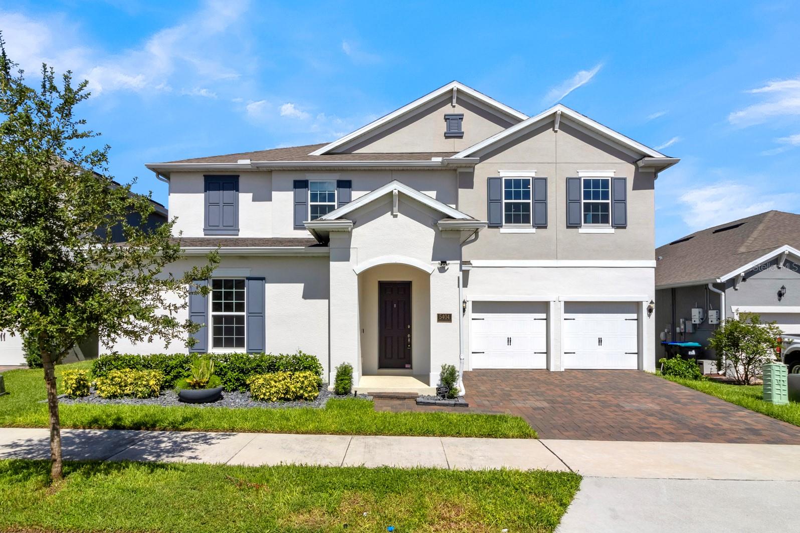Welcome to 5404 Golden Apple Drive, an extraordinary 6-bedroom, 5-bathroom residence nestled in the Horizon West community of Winter Garden, FL. Built in 2021 by Dream Finders, this stunning home offers a perfect blend of luxury, comfort, and modern convenience, making it an ideal choice for those seeking a high-end rental experience. As you step inside, you'll be captivated by the expansive great room, seamlessly connected to a gourmet kitchen that's every chef's dream. The kitchen boasts double ovens, an oversized island, and extensive upper and lower cabinetry, providing ample storage and counter space for culinary creations. This main floor also features two versatile bedrooms, perfect for use as guest rooms or home offices. The second floor is designed for ultimate entertainment and relaxation. A large loft area offers endless possibilities for family fun and gatherings, whether it's movie nights, game days, or creating your own home theater. The expansive primary suite provides a private retreat, complete with a luxurious ensuite bathroom and generous closet space. The outdoor space is just as impressive, with a fully fenced-in backyard featuring a beautiful saltwater pool and low-maintenance artificial turf. It's an ideal setting for outdoor entertaining or simply unwinding after a long day. Additional highlights include a spacious 2-car garage, offering secure parking and additional storage. The Horizon West community, known for its rich history and thoughtfully designed villages, offers top-rated schools, convenient access to shopping and dining, and a welcoming atmosphere. Don't miss this rare opportunity to rent a luxurious home in one of Winter Garden's most sought-after communities. Schedule your private showing today and experience the exceptional lifestyle that awaits at 5404 Golden Apple Drive.