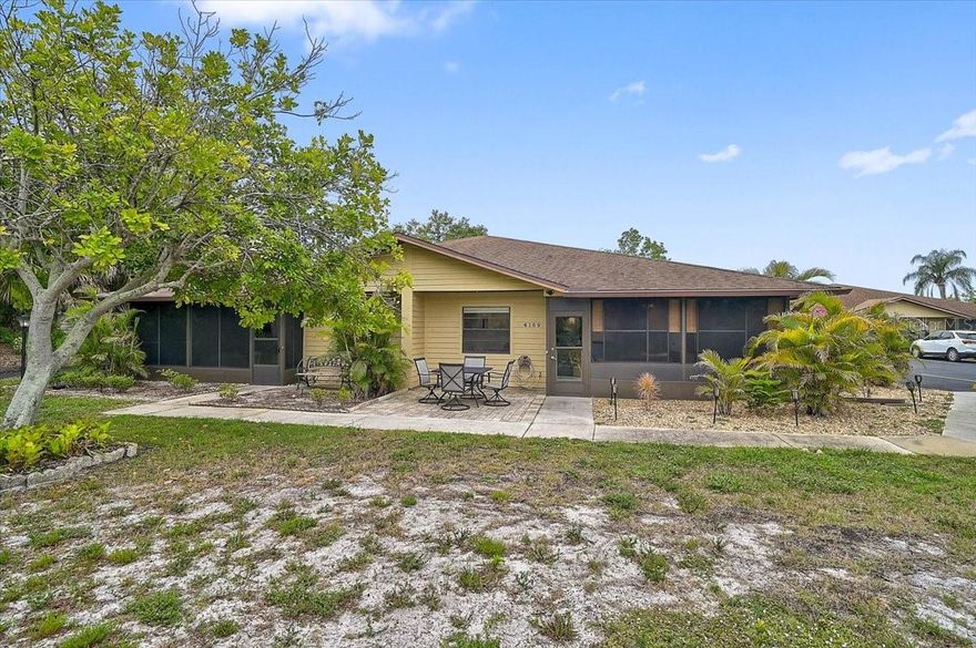 4169 66th Street Circle W, Bradenton, FL – Welcome to carefree Florida living in the highly desirable 55+ community of Heritage Village! This completely renovated 2-bedroom, 2-bath residence showcases quality upgrades and designer touches throughout. Located in a non-flood zone, this move-in-ready villa offers peace of mind along with exceptional style and comfort.

The stunning high-end remodeled kitchen features granite countertops, stainless GE appliances, custom cabinetry, designer lighting, and an open, functional layout perfect for entertaining. Both bathrooms have been beautifully updated with upscale finishes, including Toto toilets for added luxury and efficiency. AC,-2019 Hot water heater 2021.

Enjoy relaxing mornings or peaceful evenings from the front lanai overlooking the beautifully landscaped garden and walking trail area filled with mature trees and lush green space. The spacious laundry room includes a full-size washer and dryer, plus a built-in desk and matching custom cabinetry that seamlessly complements the kitchen design.

Additional highlights include custom fixtures and lighting throughout, two parking spaces, abundant storage, and meticulous attention to detail in every room. Heritage Village offers low-maintenance living in a prime Bradenton location close to shopping, dining, medical facilities, golf courses, and just a short drive to the world-famous beaches of Anna Maria Island. Rarely does a fully remodeled unit with this level of quality and location become available—schedule your private showing today!