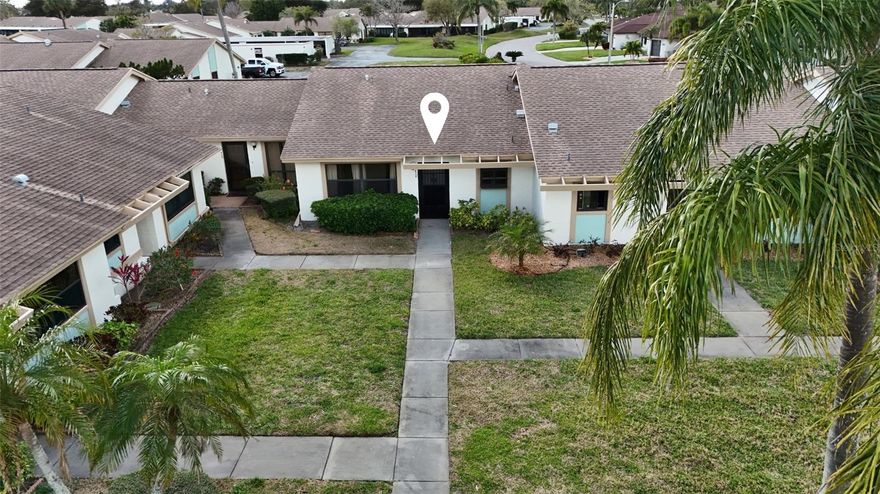 One or more photo(s) has been virtually staged. One or more photos have been virtually staged. Just 5 miles from the world-famous white sand beaches of Anna Maria Island, this fully renovated, move-in-ready 2-bedroom, 2-bath condominium offers exceptional value in the highly desirable, pet-friendly MeadowCroft South 55+ community, one of the area’s best options for easy, low-maintenance Florida living.

Step inside to a bright and modern open floor plan highlighted by vaulted ceilings and a thoughtfully designed split-bedroom layout that provides both comfort and privacy. The spacious living area flows seamlessly to an oversized lanai, perfectly positioned in a quiet, low-traffic section of the community, ideal for relaxing evenings while enjoying Florida’s stunning sunset skies.

This beautifully updated home features numerous upgrades, including:

• New A/C (2025)
• Custom white shaker-style kitchen cabinetry
• Elegant quartz countertops with matching backsplash
• Premium stainless-steel appliances
• New in-unit washer/dryer combo
• Ceramic tile flooring throughout
• Fresh interior paint
• All new shaker-style interior doors, trim, and baseboards
• Whole-house tankless water heater

Both bedrooms offer generous walk-in closets, and the primary suite provides a comfortable retreat ready to enjoy while allowing you to add your own personal touches over time. A covered carport and additional storage space add everyday convenience.

Residents of MeadowCroft South enjoy a welcoming community atmosphere and a variety of amenities including a heated pool and spa, scenic lake with fountain, and a covered cabana with bathrooms, showers, and lounge areas, perfect for social gatherings and relaxing afternoons.

Just three minutes away, GT Bray Park offers tennis courts, covered pickleball courts, a full fitness center, playgrounds, and beautiful nature trails. The location also places you close to shopping, dining, golf courses, IMG Academy, Blake Medical Center, and Sarasota-Bradenton International Airport (under 10 miles).

Whether you’re searching for a seasonal getaway, full-time residence, or income-producing investment, this thoughtfully updated condo offers the perfect combination of comfort, convenience, and coastal lifestyle.