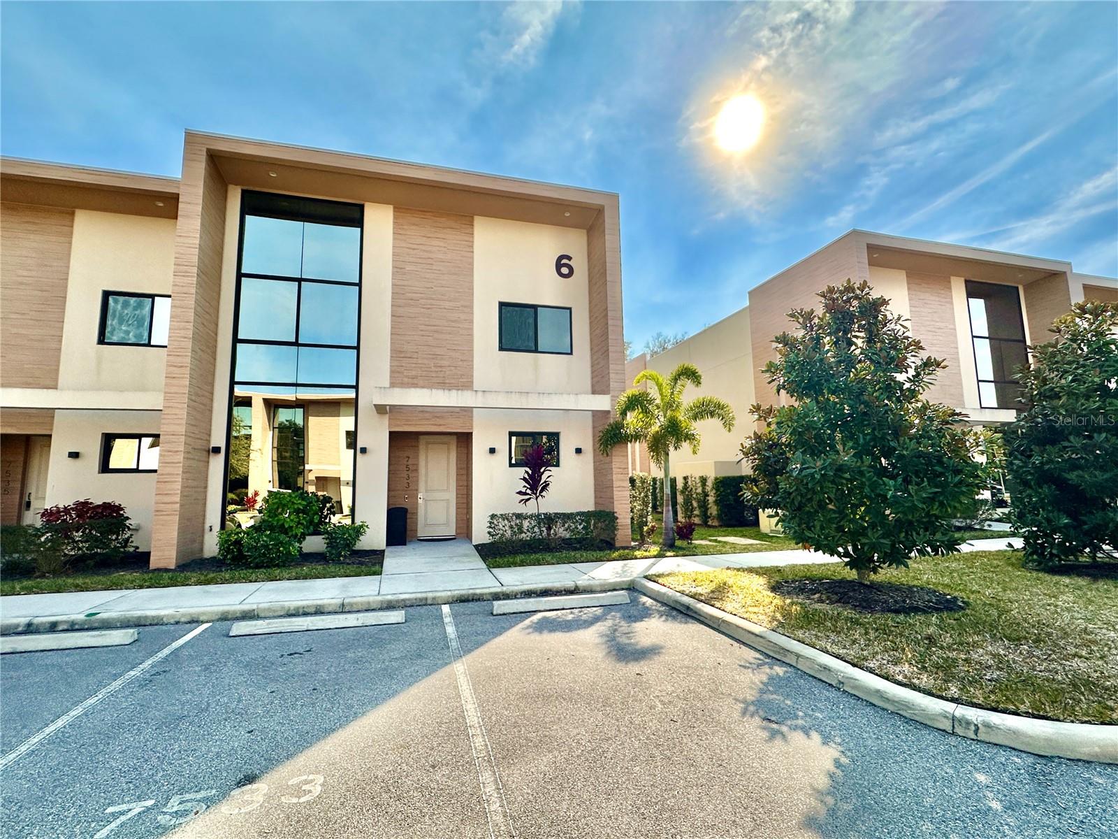 Fully furnished four-bedroom, 4.5-bath townhome just 5 minutes from Disney's Maingate. This spacious unit features a gourmet kitchen with high-end appliances, full-size laundry and an inviting open-concept layout. Enjoy a private outdoor patio with a summer kitchen, ideal for entertaining. The owner has taken excellent care of the property and made several small upgrades, enhancing comfort and functionality. The Magic Village Views community offers 24-hour concierge and clubhouse, fitness center, kids, playroom, on-site restaurant and optional housekeeping services. An opportunity for short-term rental or personal vacation use, combining the comfort of a home with convenience of resort-style amenities.