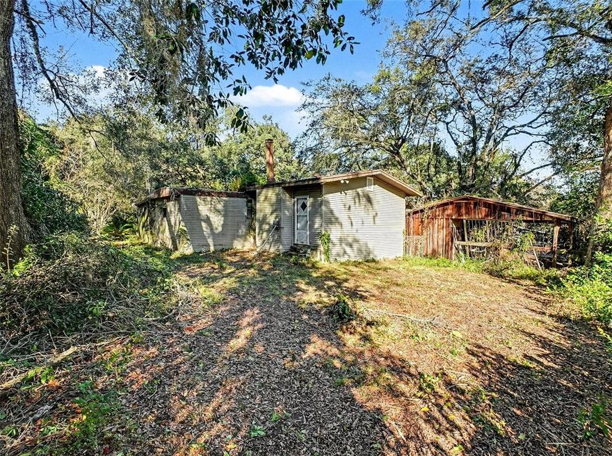 Welcome to 4818 Sadler Road ! A Rare Opportunity to Enjoy the Perfect Balance of Peaceful Country Living and Modern-Day Convenience in the Heart of Apopka!

Set on an expansive 1.16-acre lot, this private property is tucked away on a quiet street, offering space, seclusion, and flexibility that are increasingly hard to find. Whether you’re dreaming of building your custom home, investing in land, or creating a secluded retreat, this property provides the freedom to make it your own.
The property includes a mobile home that is currently inhabitable, presenting options for interim use or future redevelopment. Surrounded by mature greenery and Florida’s natural beauty, you’ll enjoy the tranquility of rural living without sacrificing proximity to shopping, dining, parks, and major highways.
Wake up to open skies, unwind in nature, and embrace a lifestyle where privacy meets accessibility—this is more than a property, it’s a way of life.
Schedule your private showing today and explore the endless possibilities at 4818 Sadler Road.