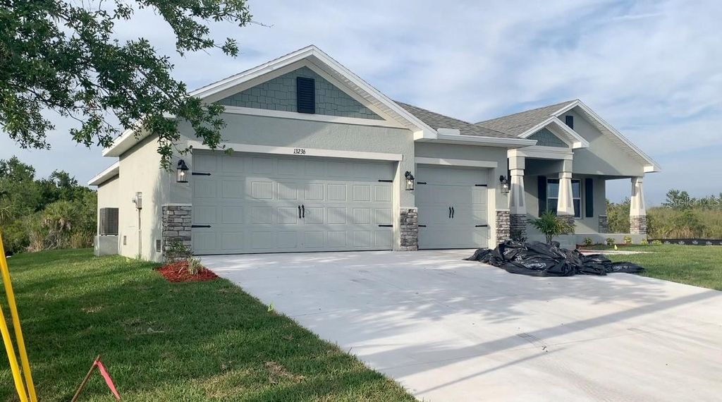 Photo of 13236 Pace Circle, Port Charlotte, FL 33981 (MLS # C7509419)