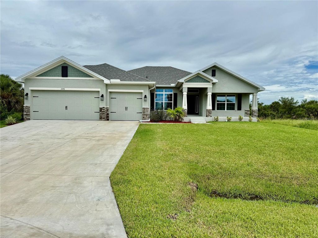Photo of 13236 Pace Circle, Port Charlotte, FL 33981 (MLS # C7509419)