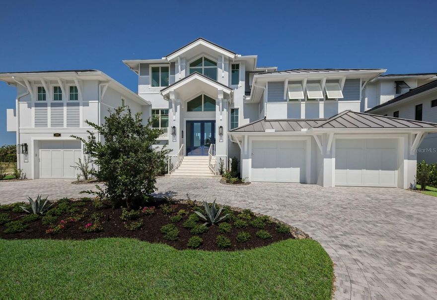 Brand New Construction*** Another Luxury Model Home at Hill Tide Estates is now completed and turnkey ready! The ‘fully furnished’ Sunny Isles Model presented by Seagate Development Group & Theory Design features a unique blend of elegance and precision craftsmanship. The multi-level floor plan offers panoramic water views of Boca Grande Pass and sunsets over the Gulf of Mexico. Theory Design’s custom décor furniture package offers convenience and instant gratification for the most selective Buyer. The second level / main floor features a spacious Master Suite with an additional VIP Suite that will be enjoyed by your special guests. Seagate's showcase custom kitchen is tastefully appointed with beautiful wood cabinetry, Thermador built in appliances, massive quartz dining island, and a cocktail cabinet with beverage cooler & ice maker. Outdoor living will be the focal point of this model as the elevated custom saltwater pool & spa is conveniently accessed off the main level. Elegant waterfalls gently spill over into main pool complemented with custom spa and sun shelves. The spacious covered lanai features remote screens, custom double sided fireplace, and an outdoor summer kitchen. The top / third level offers 2 additional bedroom ensuites, and a captivating sunset room with additional beverage & ice maker for entertaining. Hill Tide Estates or the “Jewel of Boca Grande” is majestically positioned along the shores of Boca Grande Pass. This 19-luxury home site development offers panoramic seascape unmatched anywhere else on Gasparilla Island. The gated community features a private tiered beach, and a unique private fishing / observation pier in Boca Grande Pass exclusive for the 19 homeowners.
