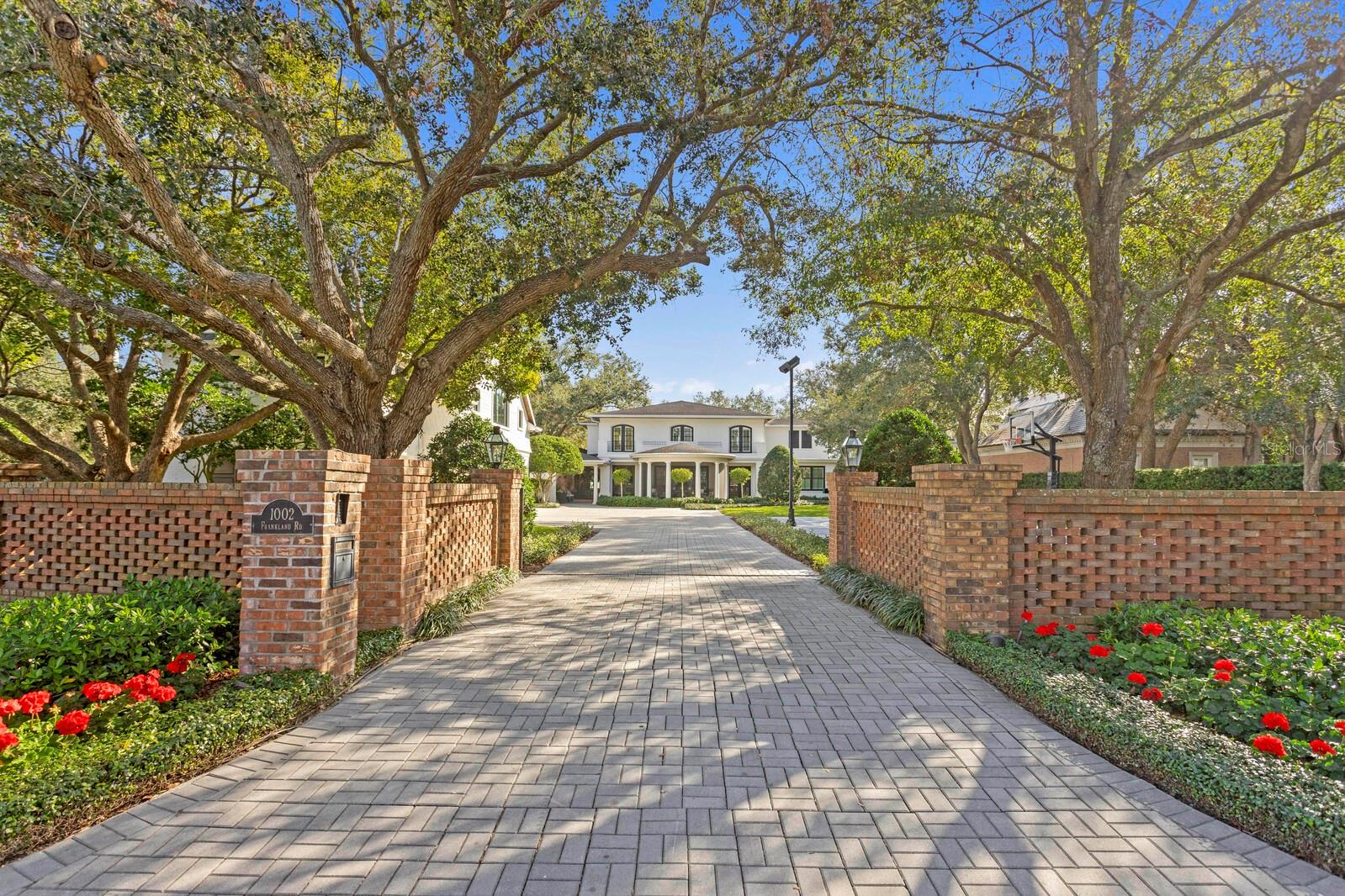 Nestled on the fifth hole of the prestigious Palma Ceia Golf Course, this exquisite property offers an exceptional living experience for those who appreciate sophistication & style. 1002 S. Frankland Road was renovated top to bottom by Soleil Design Build. The home, sitting on .72 acres, boasts an open-concept floor plan with spacious living areas, all designed with impeccable attention to detail. You will appreciate the thoughtful attention given to creating quality gathering spaces in the home. The stately entrance features an electronic gate for added security, brick-pavered drive, & courtyard with a 4 car garage. A grand set of double doors welcomes you into the home as you begin to notice & appreciate the meticulous details & elegant design. All spaces flow seamlessly out to the private backyard oasis with breathtaking views of the golf course. Large windows flood the interiors with natural light, creating a bright & inviting atmosphere. The oversized dining room, complete with chic wet bar & wine cellar, opens to a covered porch at the front of the home. The kitchen is grand in every way & will impress the most accomplished chef! Enjoy thick marble countertops/backsplash/surround, Wolf-Subzero appliances, double island/bar area, a sizable storage/pantry area, & a breakfast nook overlooking the spacious backyard. Open the sliding doors & prepare to be amazed at the beautifully landscaped grounds with views of the lush greens & fairways of Palma Ceia Golf Course. Take a dip in the saltwater pool, try a cold-plunge, practice your short game on the putting green, or roast marshmellows at the oversized firepit. The summer kitchen, complete with Green Egg, provides the perfect spot to entertain outdoors, sit around the bar, & watch the big game. Or, curl up next to the fireplace on your covered lanai. So many options for dining, lounging, or simply soaking in the serene surroundings. Off the kitchen is a sunken den with a fireplace, custom built-ins, textured brick walls, & a view of the course. On the south side of the home, you’ll find two guest bedrooms & a full bathroom. This area could serve as a home office, nanny/au pair quarters, or in-law suite. Also on the first floor is a home office with an amazing view of the course (naturally!), two half bathrooms, and the first floor laundry room.
Upstairs, your luxurious primary suite awaits! Marble floors, painted concrete vanities, a steam shower and a soaking tub. The primary closet is generous in scope and size. Two guest bedrooms, each with walk-in closets and ensuite bathrooms, are also upstairs, as well as the second floor laundry room.
Now let’s talk about fun! The area over the four-car garage is one-of-a-kind & provides flex space for you to perfect your golf swing with the golf simulator OR simply enjoy a movie in the theatre room. While you're at it, grab a quick workout in your private gym. This entertainment zone has a half bath, dishwasher, ice maker, beverage fridge, and storage. Your guests might never leave! The property has a full-house Generac generator and a smart-home system to manage lighting, security, doors, gate, temperature, media, and sound. Located in one of South Tampa’s most sought-after neighborhoods, 1002 S Frankland Rd offers not only an incredible living space but also access to top-rated schools, shopping, dining, and entertainment. Don’t miss the opportunity to enjoy luxury living at its finest.