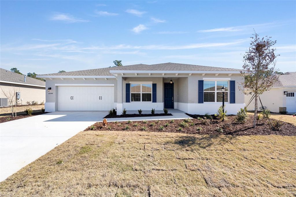 Photo of 10044 SW 106th Circle, Ocala, FL 34481 (MLS # OM718235)