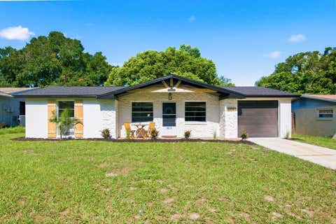 Photo of 6241 Maplewood Drive, New Port Richey, FL 34653 (MLS # TB8538401)