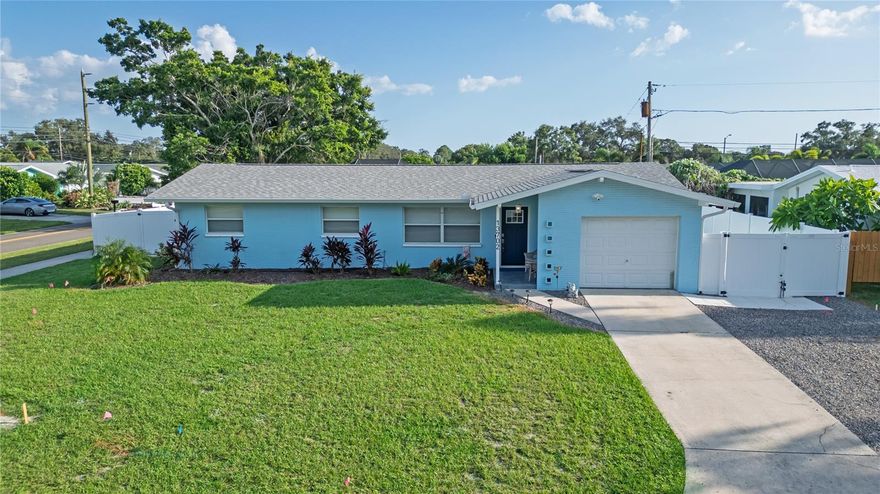 Welcome to this inviting completely renovated furnished residence, featuring sleek contemporary finishes in the desirable Seminole area. This updated, split 4-bedroom/ 2-bath floor plan with a tranquil pool oasis will captivate you from the first glance. Perfectly situated on a prominent corner lot in Seminole, a coastal suburb in Pinellas County just a short 5 minute drive to world-class beaches. Additionally, there is a bonus dining area with increased Square Footage.

Inside you’ll be welcomed by an impressively open floor plan in the chef’s kitchen showcasing its striking centerpiece – a large island crowned with the most beautiful slab of granite, also equipped with modern cabinetry and stainless steel appliances. The lighting was thoughtfully placed to accentuate the home's features. This home is designed with low-maintenance living in mind with new tasteful luxury vinyl plank flooring throughout, freshly painted walls in elegant earthy tones, creating a seamless flow between the living, dining, and kitchen areas.

The spacious primary suite offers a luxurious retreat with an ensuite bathroom, featuring upscale finishes and modern design. Three additional bedrooms are generously sized, ideal for family, guests, or a lucrative short-term market.

Outside, step into your private tranquil pool oasis, with a sparkling completely renovated pool area ($13K) complete with a brand new pump and GeoThermal Pool Chiller/Heater controlled via your smartphone. Surrounded by lush tropical landscaping, the backyard is the perfect backdrop for entertaining or quiet relaxation. Professionally landscaped grounds are accented with custom exterior lighting that elevates the home’s sophisticated charm. Little to no upkeep with the turfed yard and scheduled timing of your new automatic irrigation system. The newly installed vinyl fencing adds privacy and provides the perfect outdoor atmosphere. For added piece of mind, recent updates include a new roof (2024) and HVAC system (2022) and located in NO FLOOD!!

This property is not only the perfect primary residence, it could also be a luxury Airbnb-ready home with proven income. Combine luxury living with a smart investment opportunity! Close to PIE and TPA Airports, Dining, VA Bay Pines, World Famous White Sandy Clearwater Beach, St Petersburg Beach and so much more!
