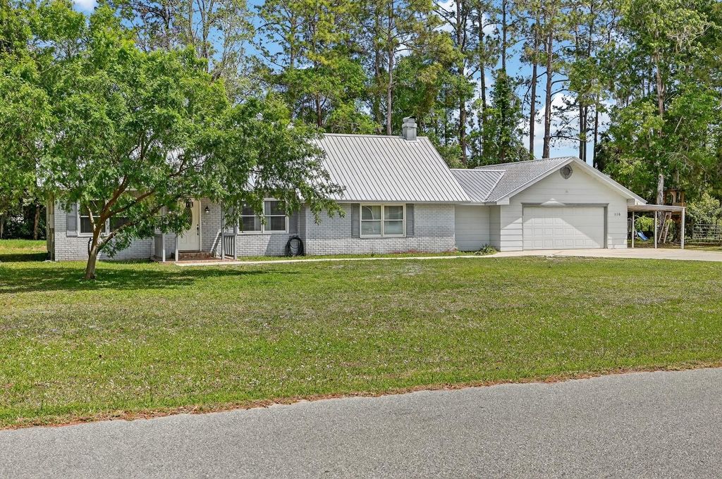 Photo of 116 Round Lake Circle, Palatka, FL 32177 (MLS # FC317465)