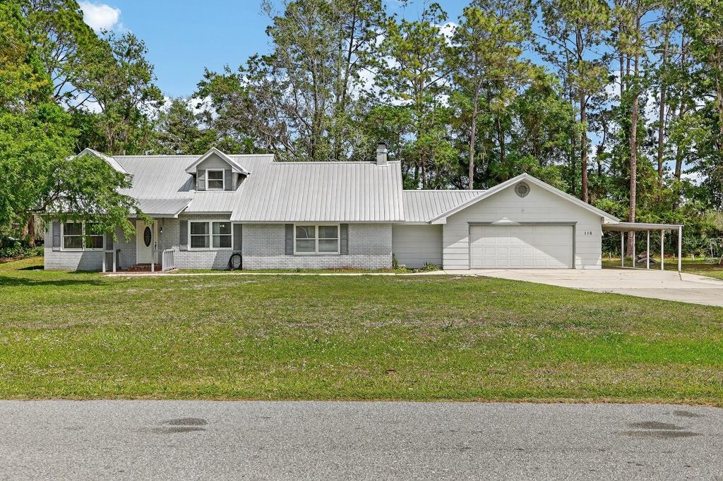 Photo of 116 Round Lake Circle, Palatka, FL 32177 (MLS # FC317465)
