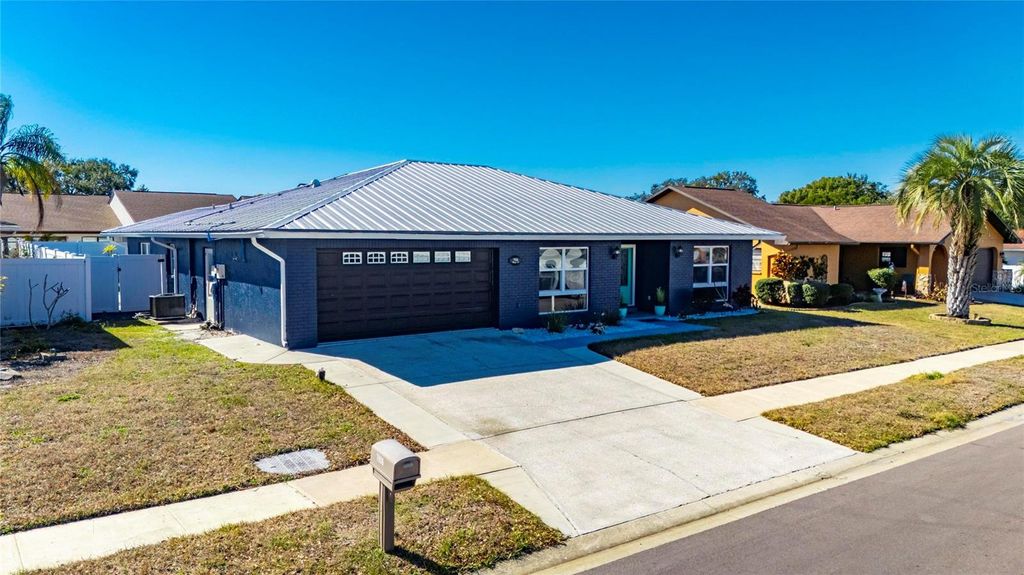 Photo of 7906 Bahama Avenue, Port Richey, FL 34668 (MLS # TB8474250)